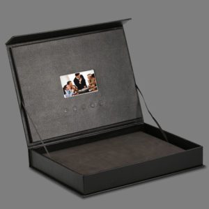 A black box with a picture of two people.