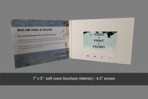 A video brochure is shown with the screen open.