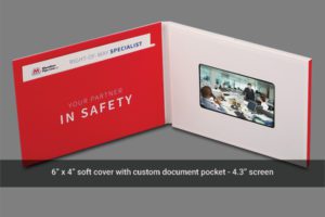 A video brochure with soft cover and custom document pocket.