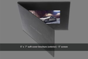 A 5 x 7 soft cover brochure with an image of a car.