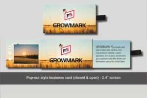 A business card with a picture of a field.