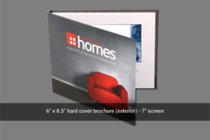 A hard cover brochure with an advertisement on it.