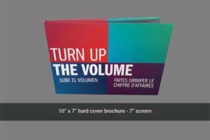 A brochure with the words " turn up the volume ".