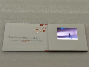 A video brochure with a picture of someone in the background.