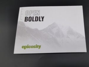 A close up of the open boldly logo on an opened book.