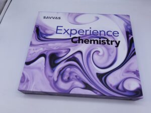 A purple book with swirls on it.