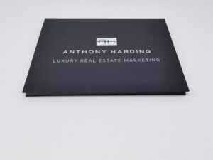 A black book with the name of anthony handing.